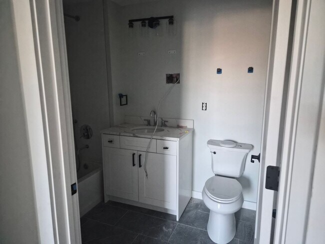 Building Photo - Downtown Claremont newly re-developed brick building with 2 Bed Luxury units, pet friendly!