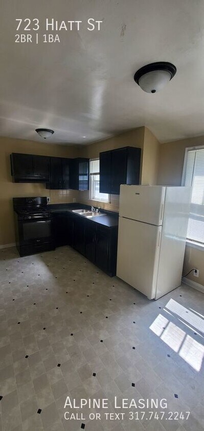 Building Photo - West Indy 2BR House w/Garage!