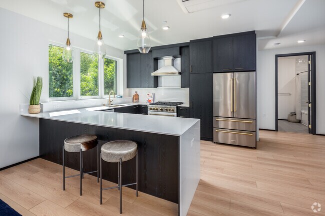 2 habitaciones, 2 baños - 1245 pies cuadrados - Comedor - Cypress Apartments