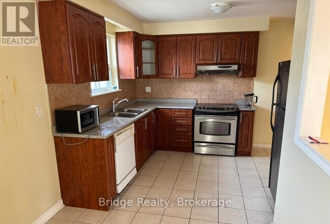 Photo du bâtiment - 7075 Magic Ct