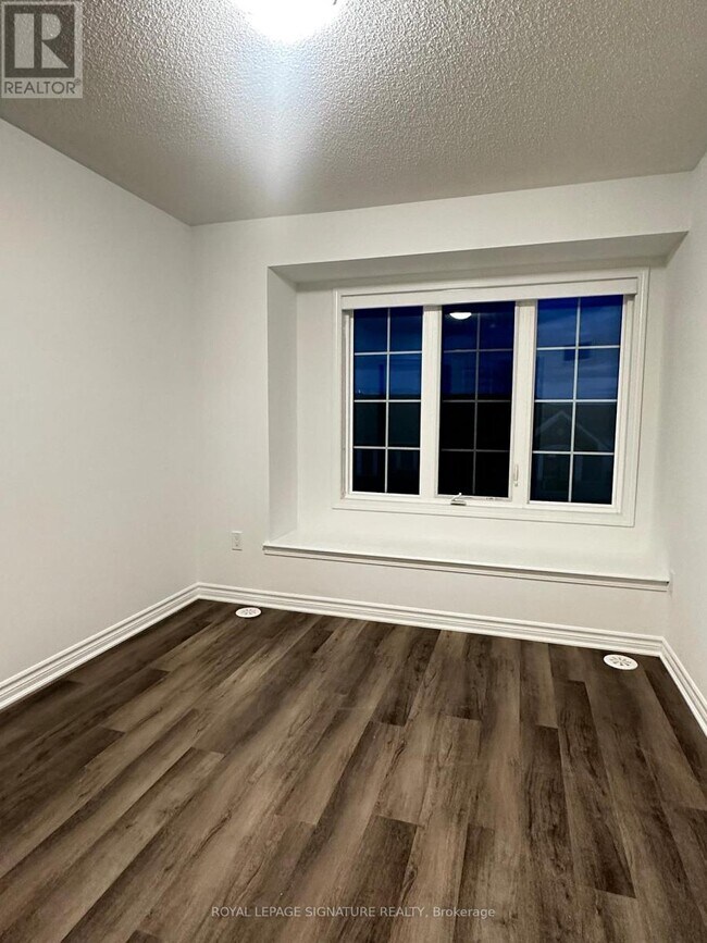 Photo du bâtiment - 1259 Lily Cres