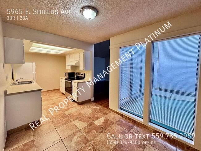 Building Photo - 5965 E Shields Ave