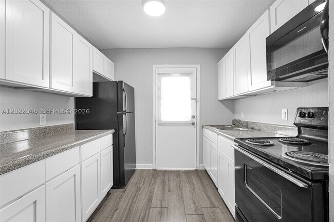 Building Photo - 400 NW 65th Ave