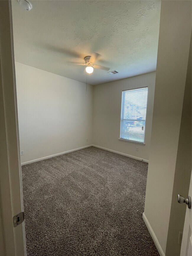 Foto del edificio - 5006 Pine Ridge Knoll Ct