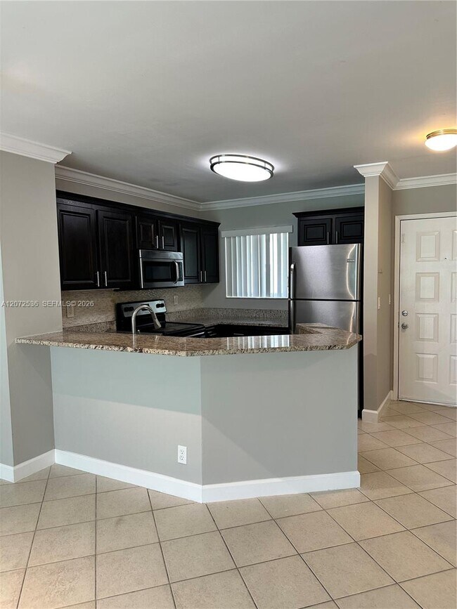 Foto del edificio - 8750 N Sherman Cir
