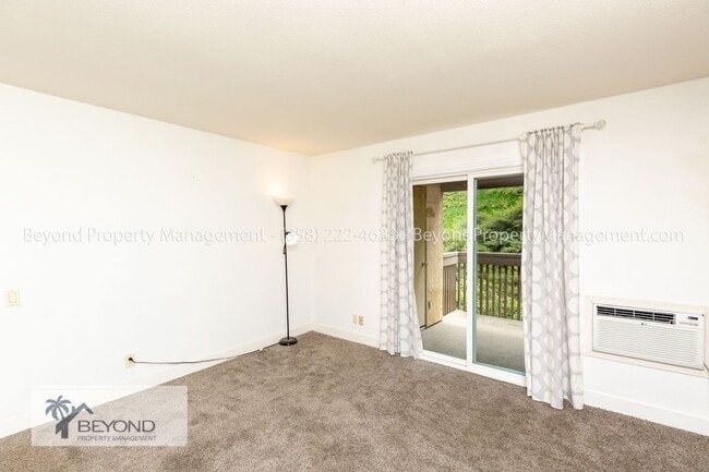 Building Photo - CHARMING JUNIOR 1-BEDROOM END UNIT IN HIGH...