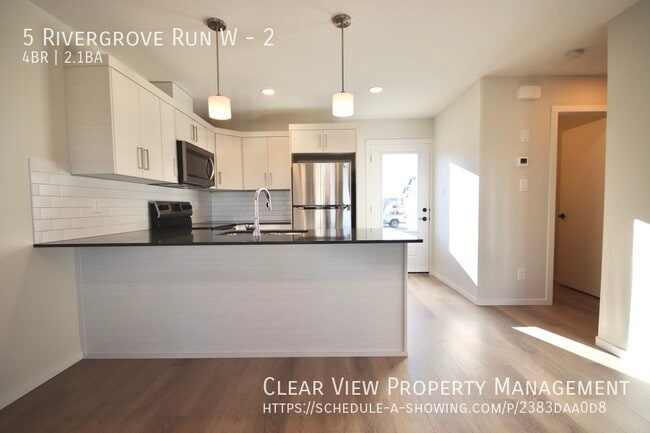 Photo du bâtiment - Beautiful 4 bedroom, 2.5 bathrooms condo i...