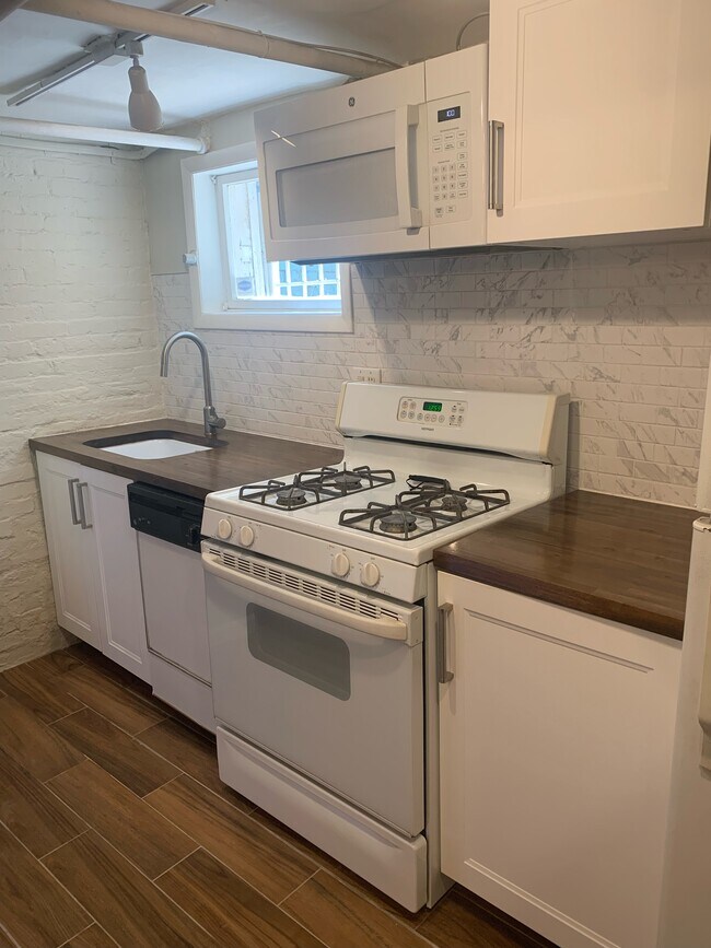 Kitchen with new butcher block counters - 1006 S St NW