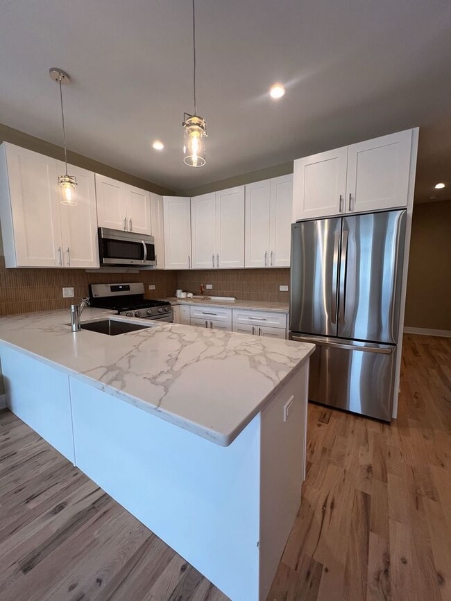 Building Photo - 4231 S Champlain Ave