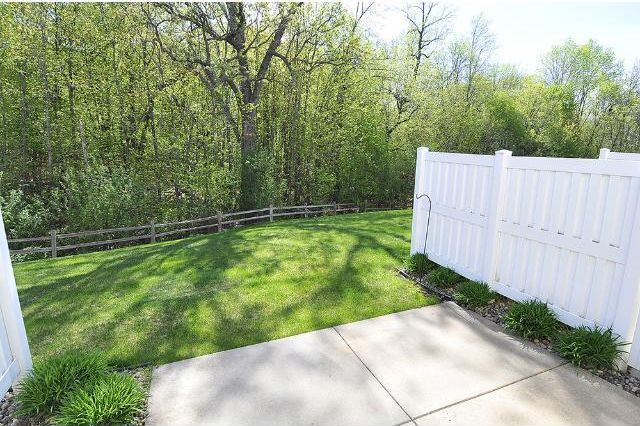 Enjoy private wooded area behind unit - 7745 Arboretum Village Circle