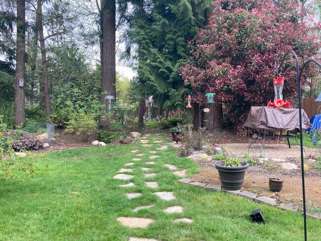 path to green belt, table & chairs - 14217 55th Ave SE