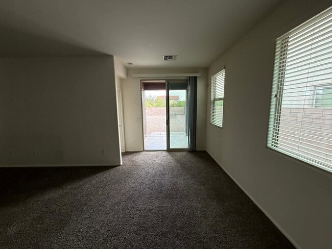 Building Photo - 10450 S Cutting Horse Dr