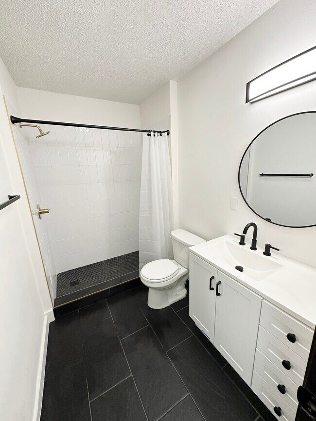 Recently renovated main bathroom. - 1197 County Road B W