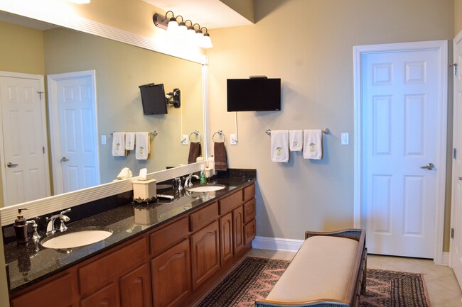 Master bathroom with walk in closet. - 2668 Beach Blvd