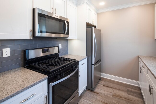 Interior Photo - Leonia Manor: In-Unit Washer & Dryer, Heat, Hot & Cold Water Included, Cat & Dog Friendly, and Wa...