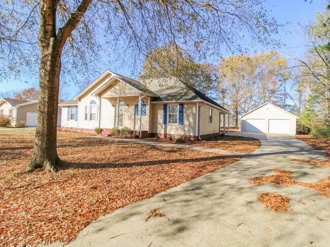 Building Photo - Nice home with Detached Garage & Storm She...