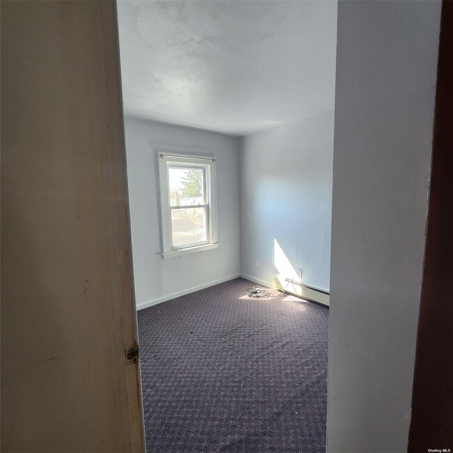 Building Photo - 202-14 33rd Ave