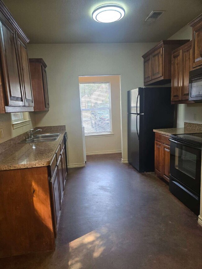 Foto del edificio - "Charming 3-Bedroom Duplex Retreat on Mandy