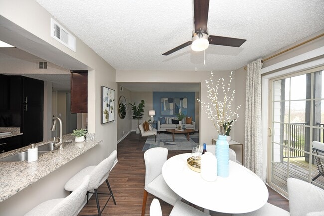 Dining area with hardwood-style flooring - Views of Brentwood