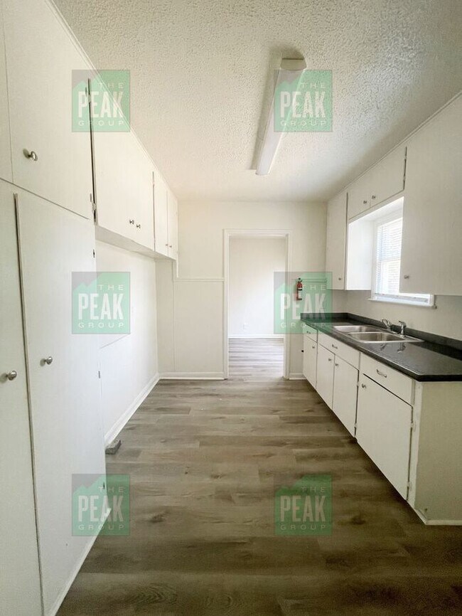 Building Photo - Scorching Hot August Specials!