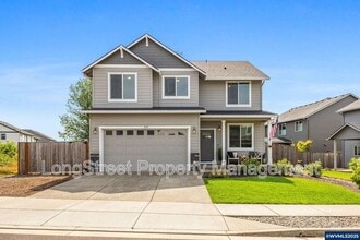 Building Photo - 7177 SE Sarah Dr