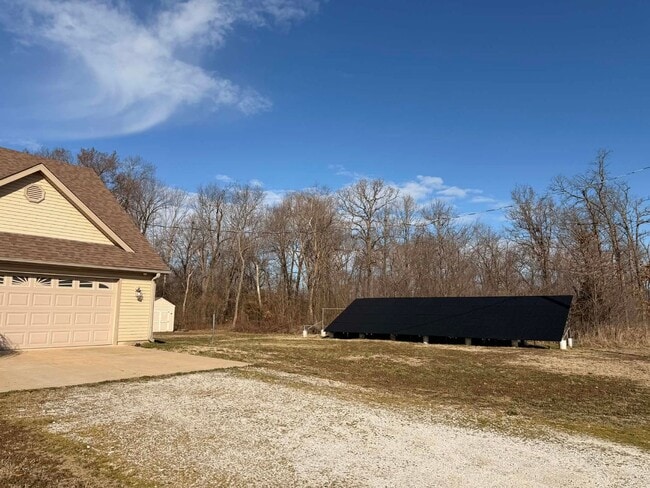 Building Photo - BEAUTIFUL 4 BEDROOMS/ 2.5 BATHROOMS ON 1 FULL ACRE IN CARL JUNCTION MO!! STORM SHELTER, GARAGE, A...