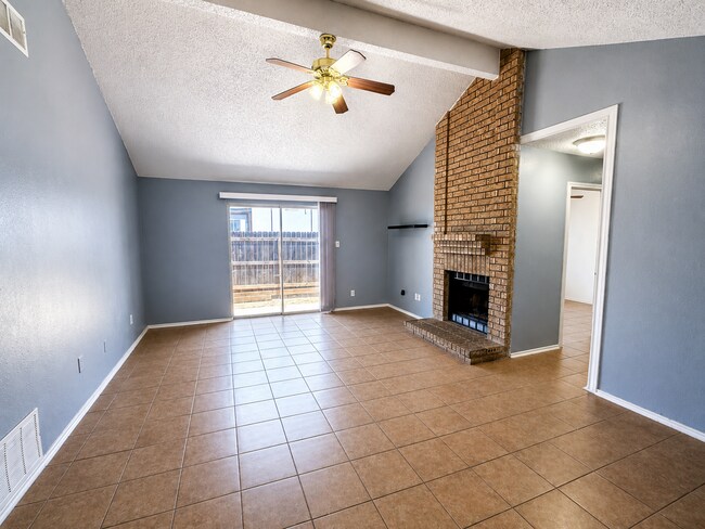 Building Photo - Move-In Ready 3BR/2BA: Updated Kitchen, New Light Fixtures & Fenced Yard