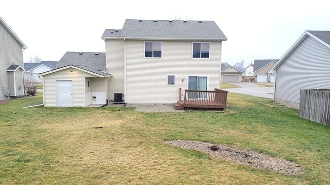 Building Photo - "Charming 4-Bedroom Haven with Finished Ba...