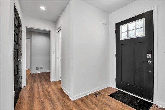 Foto del edificio - 6 Rolling Woods Ln