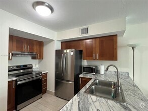 Building Photo - 9499 Collins Ave