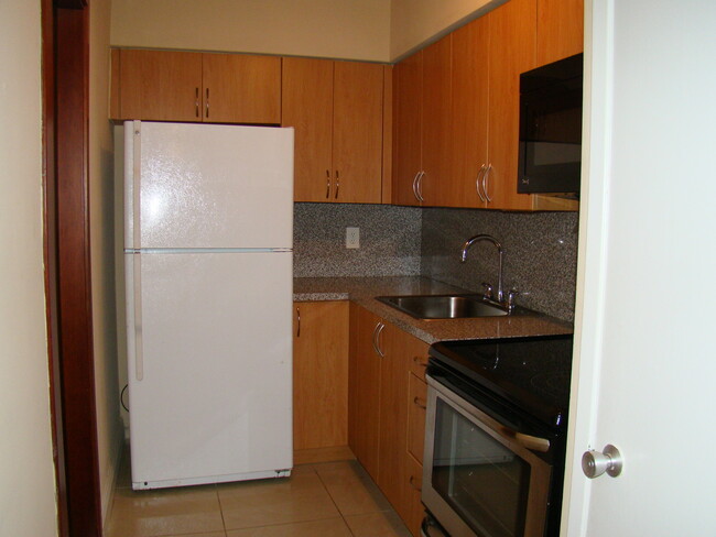 Building Photo - Move-In Special: One Month FREE + Competit...