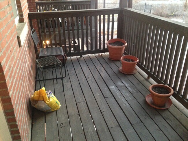 Deck with plenty of space for entertaining or planters of various sizes - 5360 Pershing Ave