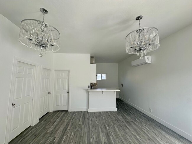 Building Photo - Welcome to your newly remodeled, charming ...