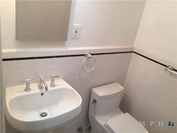 New full bath clean/white - 11 E 80th St