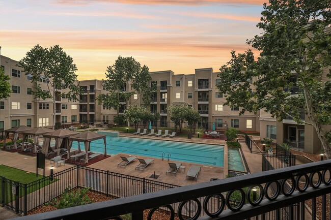 Evening Time View of the Pool at District at Medical Center, San Antonio - District at Medical Center Apartments