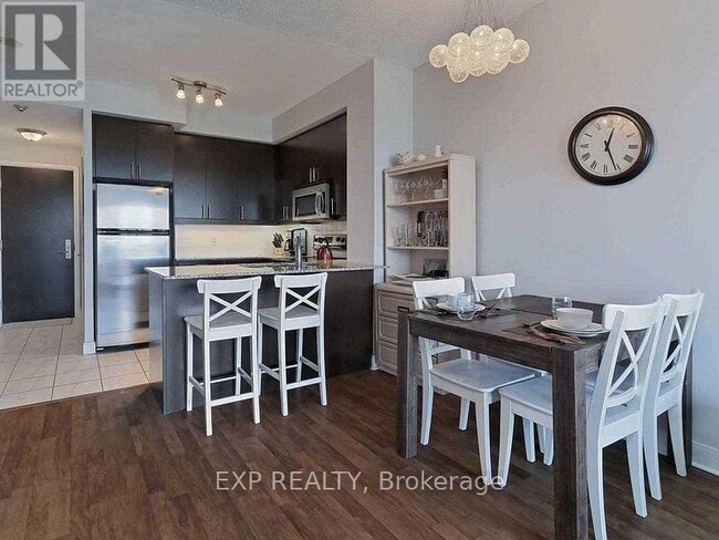 Photo du bâtiment - 50 Absolute Ave