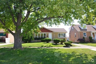 Building Photo - 10017 S Spaulding Ave