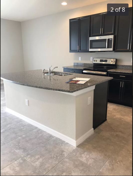 Building Photo - 7014 Grand Elm Dr