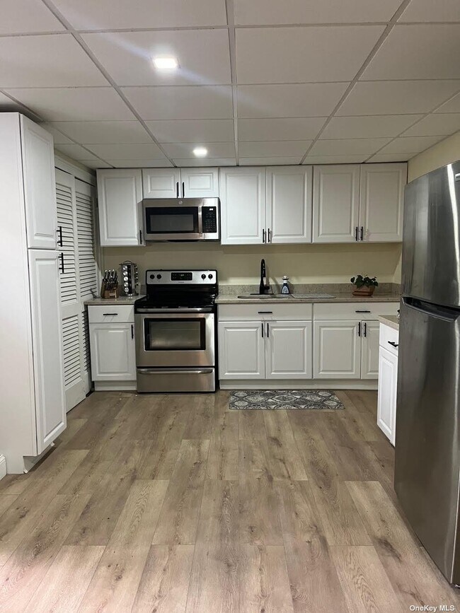 Foto del edificio - 19 Tree Hollow Ln