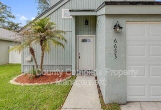 Building Photo - 6653 Periwinkle Dr