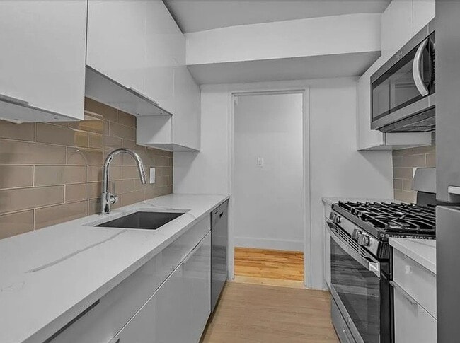 Photo - 411 E 26th St Apartment