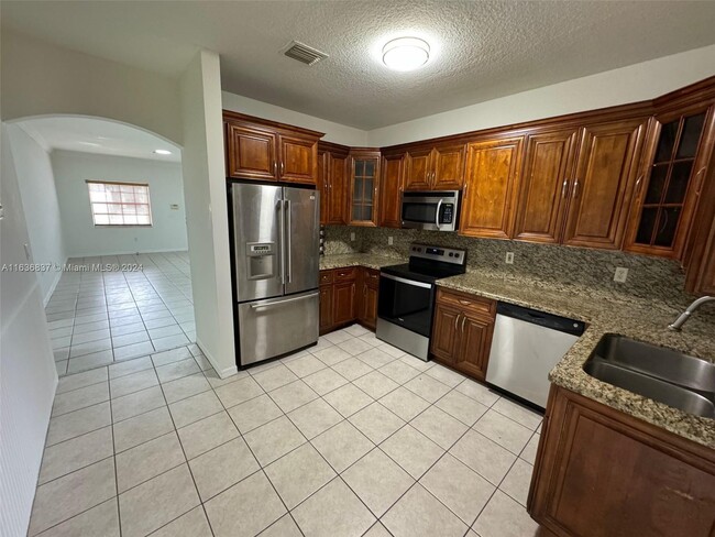 Foto del edificio - 5640 NW 115th Ct