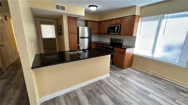 Building Photo - 8560 Creekwood Way