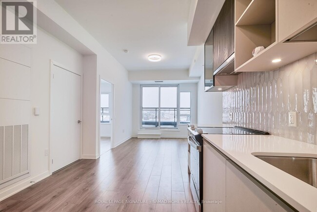 Photo du bâtiment - 395-395 Dundas St W