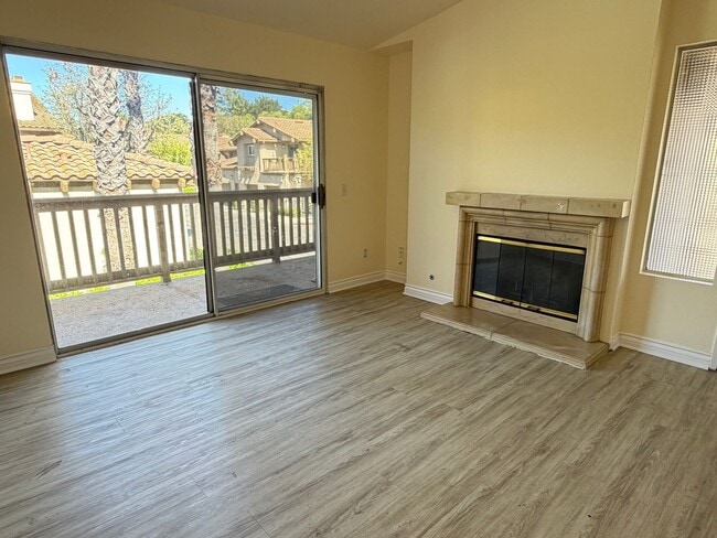 Building Photo - BEAUTIFULLY REFRESHED UPPER-LEVEL CONDO WITH GARAGE & RESORT-STYLE AMENITIES