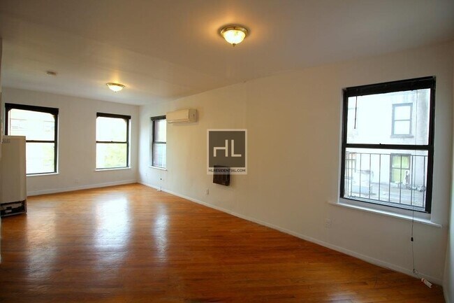 Building Photo - Sunny Studio in Prime East Harlem