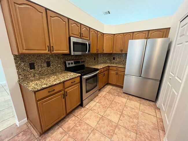 Building Photo - Spacious Pool home, 4 bedrooms, 3 full bat...