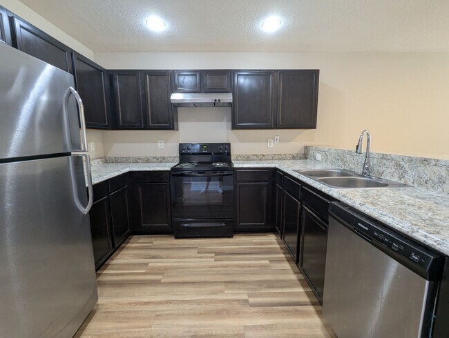 Building Photo - SPECIALS: *WAIVED $250 Admin Fee (app. fee not incl.); REDUCED RATE ON THIS 18mo LEASE (15mo & 12...