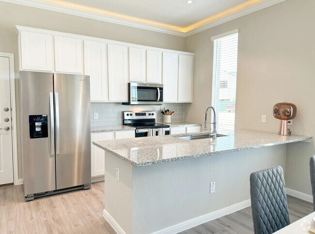 Kitchen with Peninsula - West End Estates