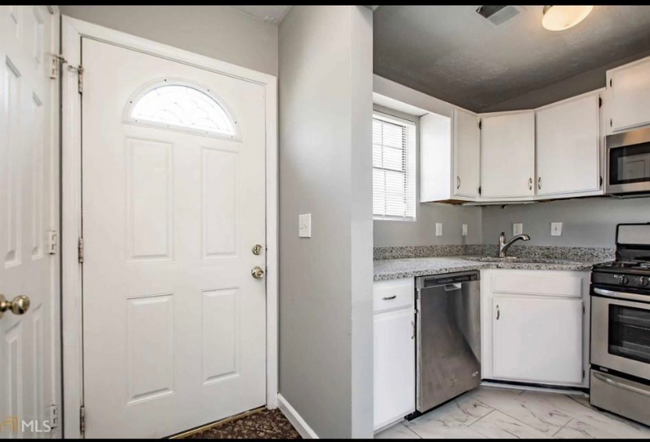Building Photo - 6988 Flagstone Dr
